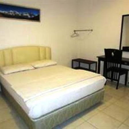 Mendu Inn Kuching Habitación foto