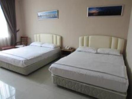 Mendu Inn Kuching Habitación foto